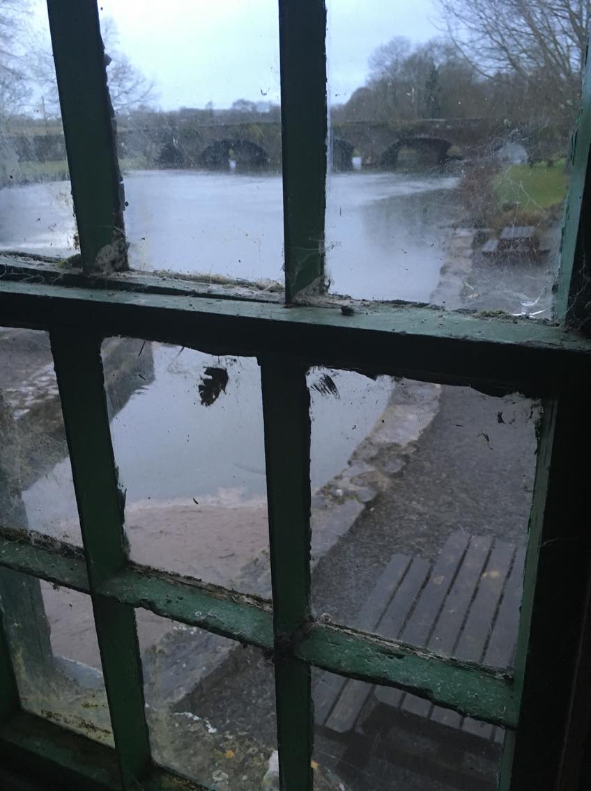 View out of window of Mullins Mill, Kells, Kilkenny facing the bridge.